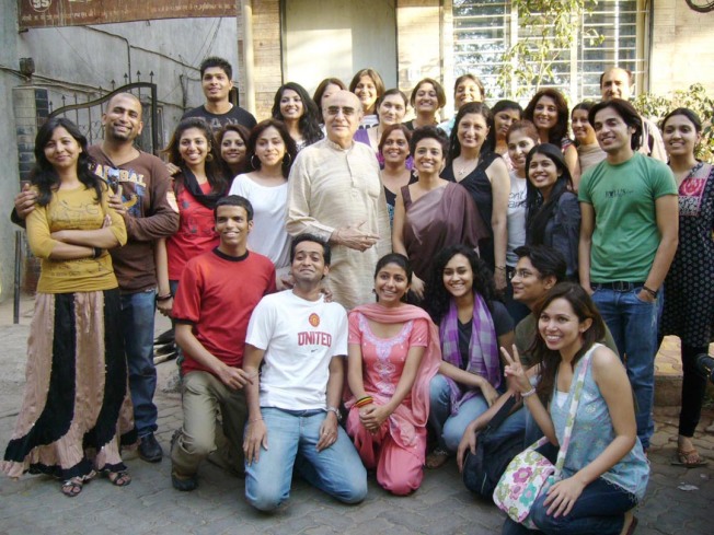 Kishore Namit Kapoor posing with his Students